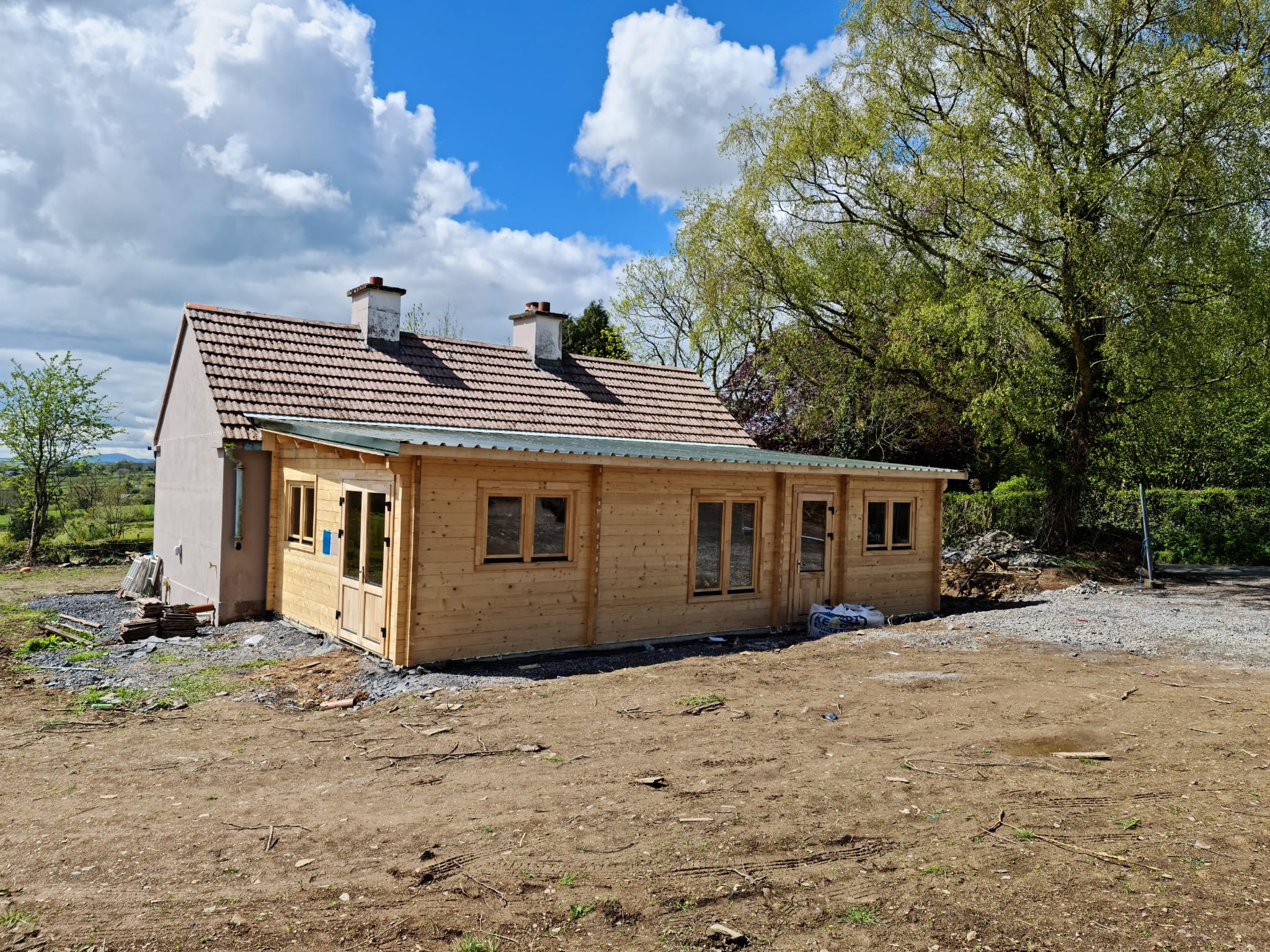 image of house with a timber frame extension onto the back