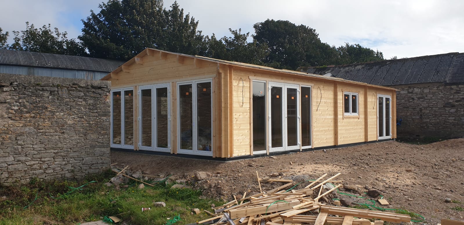 image of a timber frame home with windows installed
