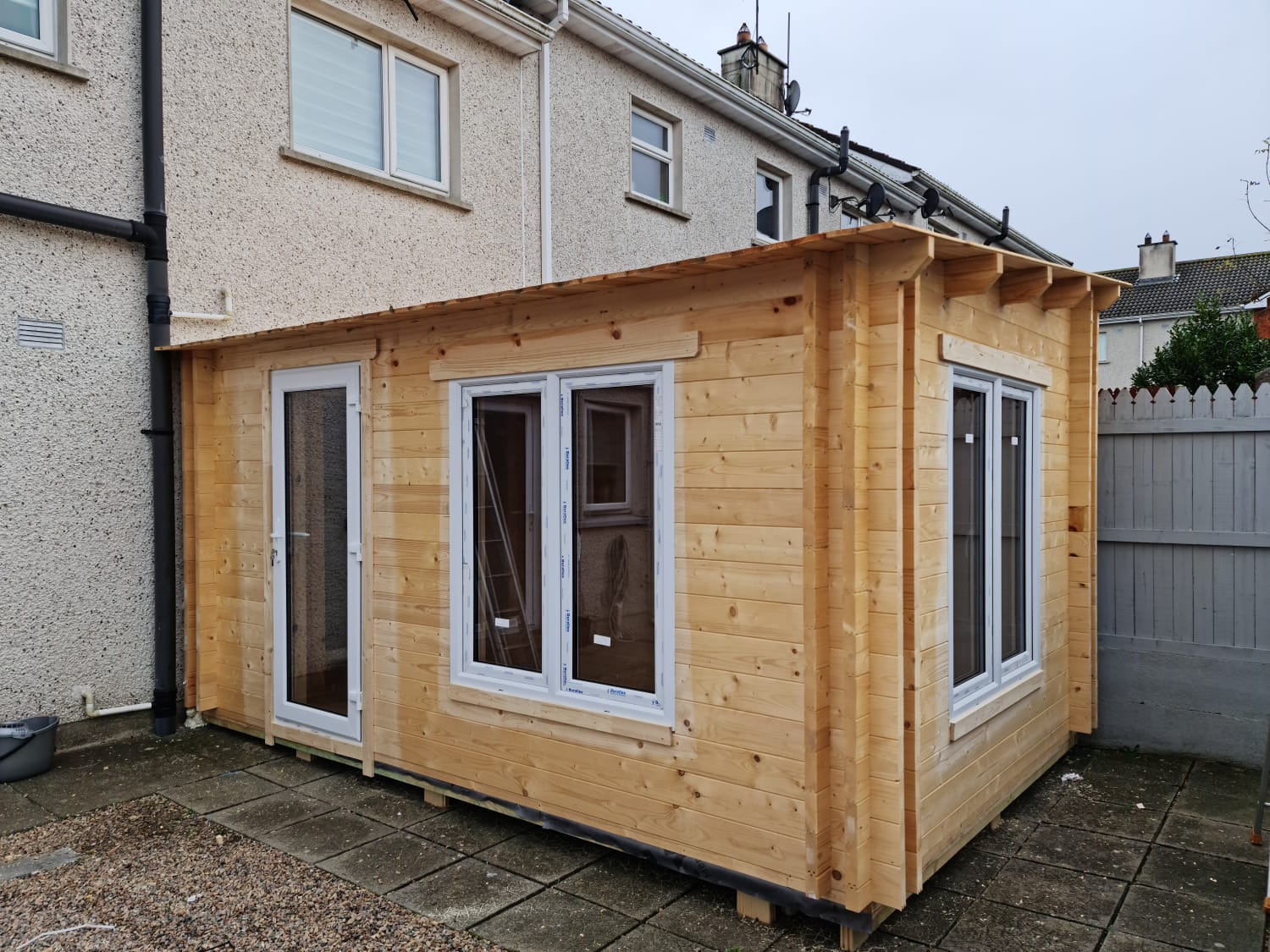 image of a timber frame extension onto a house
